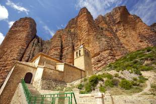 The Mallos de Riglos rock formations form a part of the foothills of the Pyrenees in Spain, Europe.