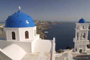 A church with a view in the village of Oia in Santorini, Greece, Europe.